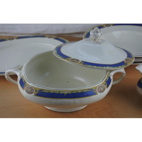 71 - A part W H Grindley & Co dinner ware to include lidded tureen, soup bowls, sauce boat and more.