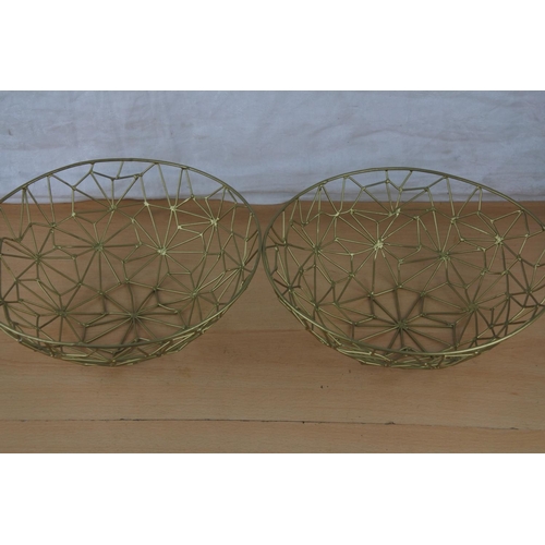 72 - Two wire baskets.