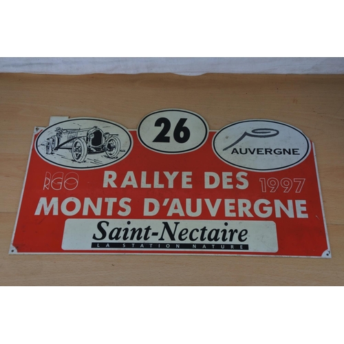 77 - A vintage plastic advertising rally sign 'Rallye des Monts D'Auvergne 1997'. Approx 27x47cm.