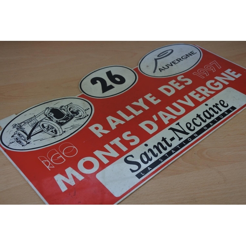 77 - A vintage plastic advertising rally sign 'Rallye des Monts D'Auvergne 1997'. Approx 27x47cm.