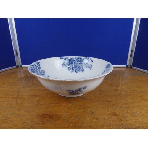 106 - An antique blue and white basin