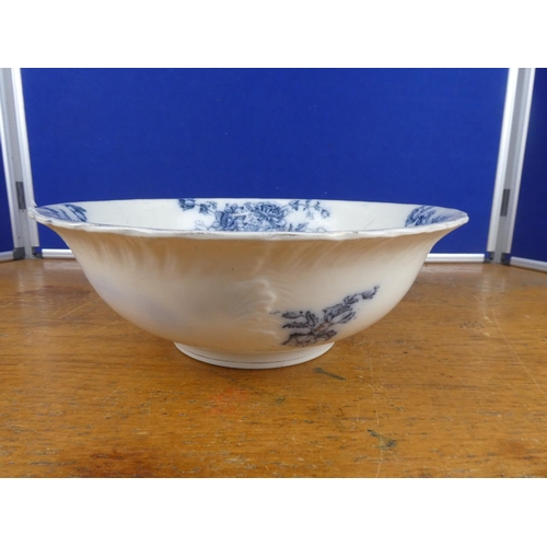 106 - An antique blue and white basin