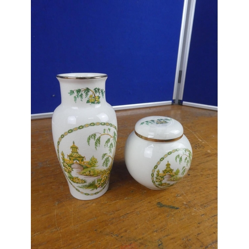 110 - A vintage Arthur Wood vase and ginger jar.