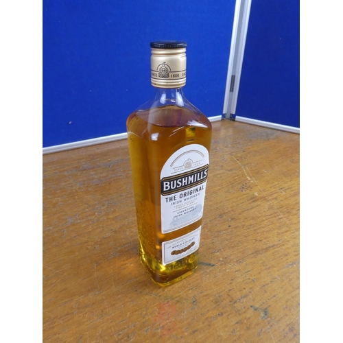 113 - A bottle of 700ml Bushmills Irish Whiskey.