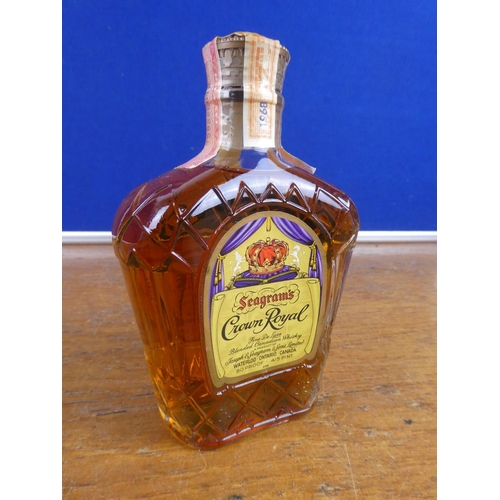 114 - A vintage bottle of Seagram's Crown Royal.