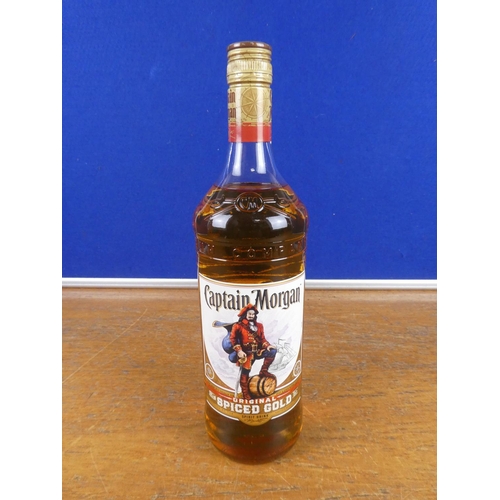 117 - A 1 litre bottle of Captain Morgan.