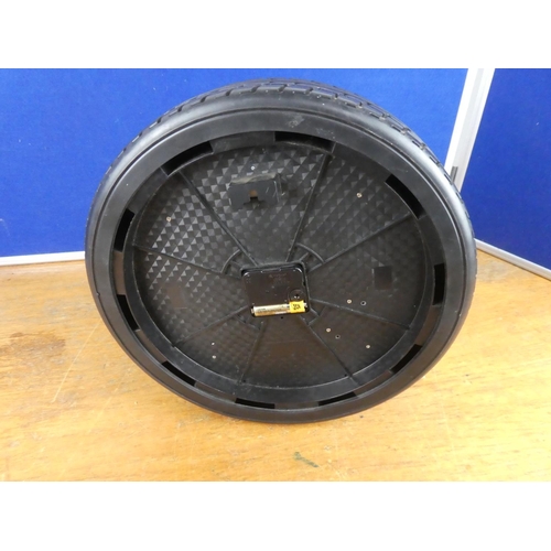 125 - A novelty tyre wall clock.