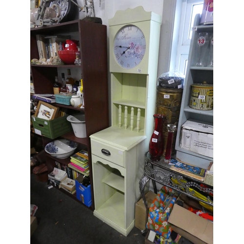 128 - An unusual slimline painted display unit with clock. Approx 187cm.