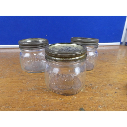 130 - Three glass jars.