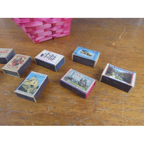 137 - A collection of vintage cigarette boxes in a wicker basket.