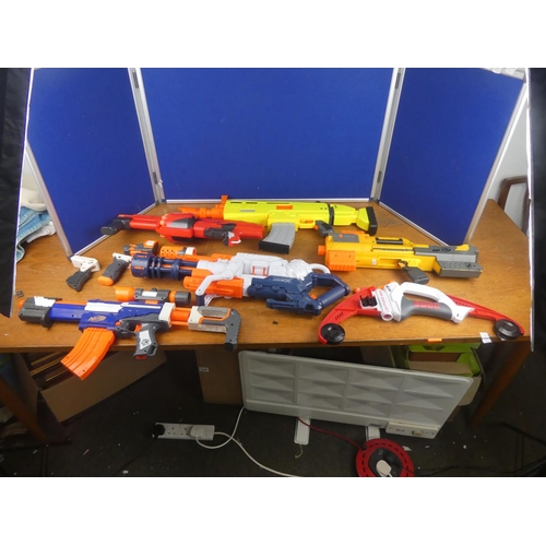 138 - A large collection of Nerf guns and more.