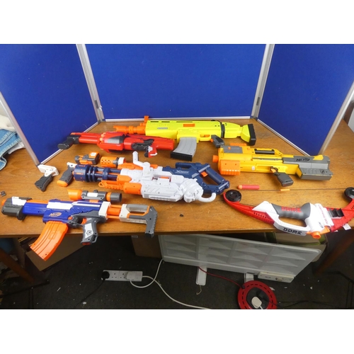 138 - A large collection of Nerf guns and more.