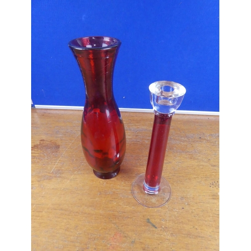 140 - A vintage ruby glass vase and candleholder. Tallest 35cm.