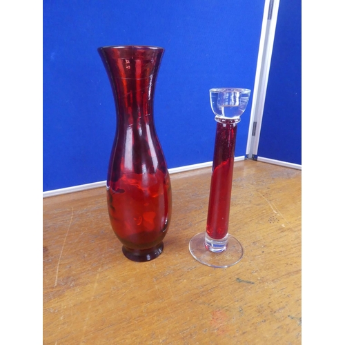 140 - A vintage ruby glass vase and candleholder. Tallest 35cm.