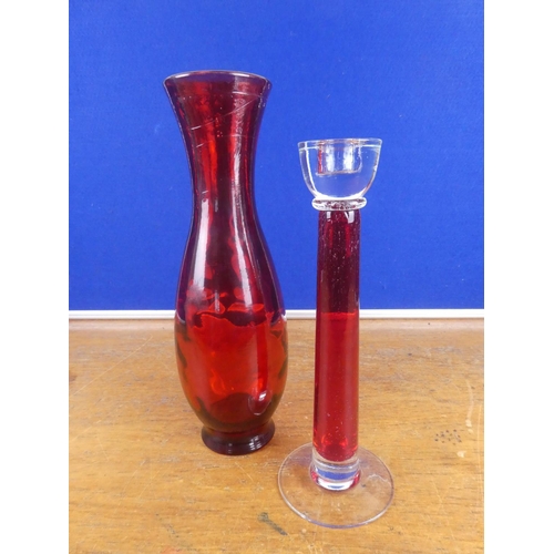 140 - A vintage ruby glass vase and candleholder. Tallest 35cm.