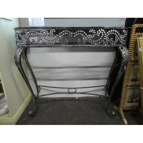 146 - A metal framed console table with glass top. Approx 83x90cm.