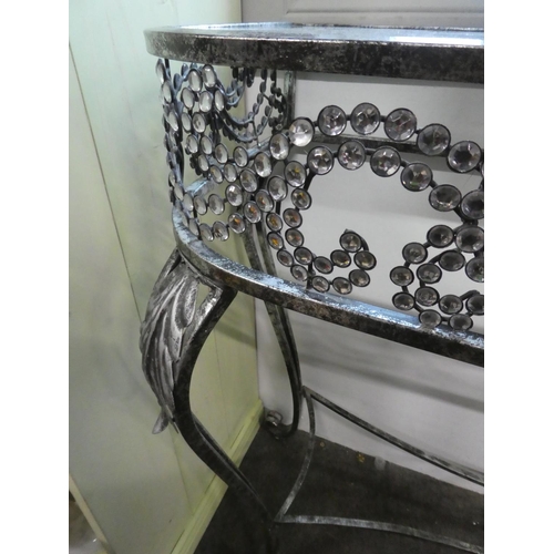 146 - A metal framed console table with glass top. Approx 83x90cm.