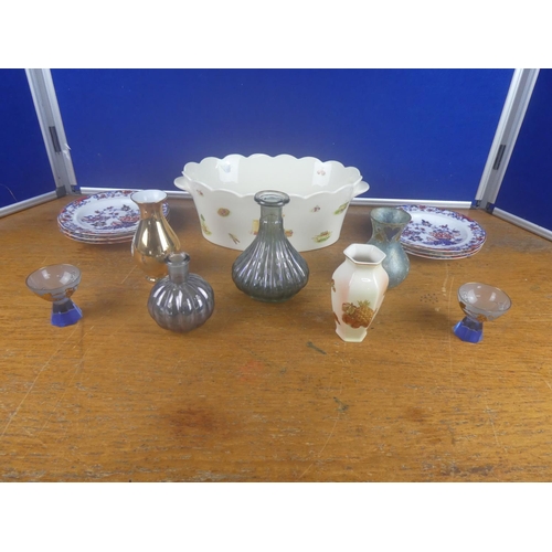 147 - An assortment of ceramics and glassware.