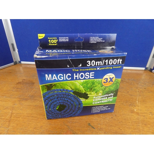 152 - A boxed 100ft magic hose.