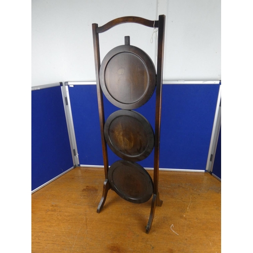 160 - A vintage three tier wooden cakestand. Approx 85cm.