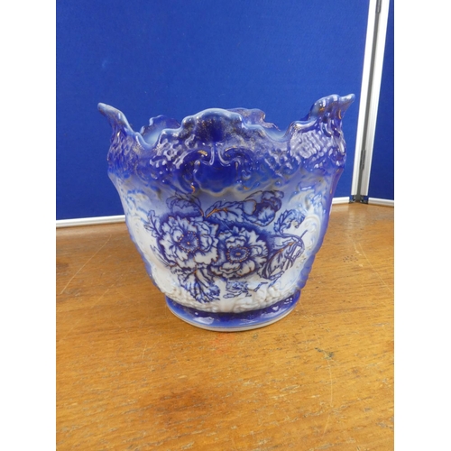 172 - A large stunning Ringtones Tea Merchants plant pot with floral design. Approx 24x27cm.