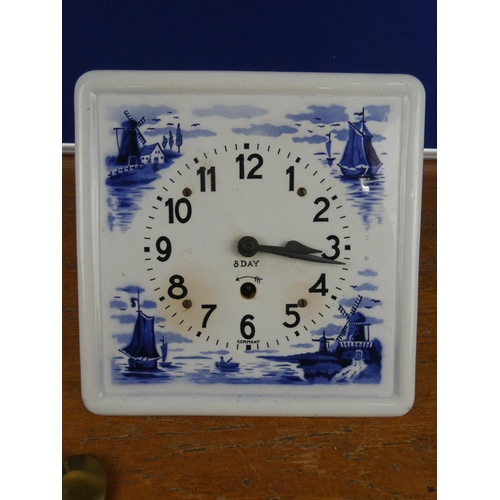 180 - A vintage ceramic German wall clock.