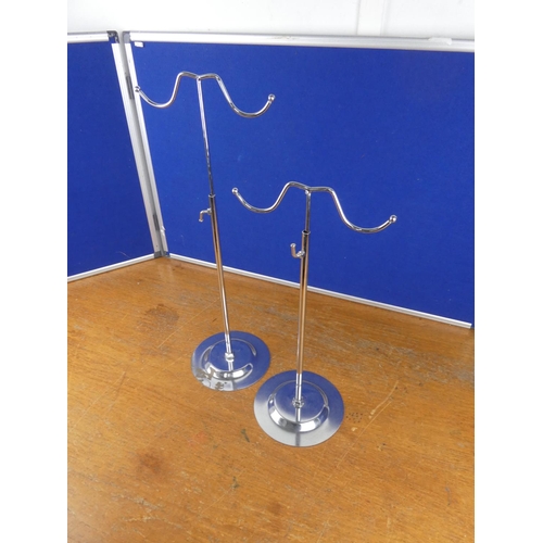 194 - Two metal shop display stands.