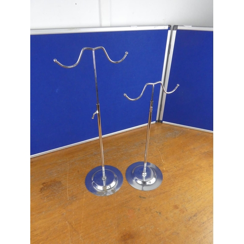 194 - Two metal shop display stands.