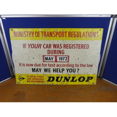 195 - A large vintage Dunlop 'Ministry of Transport Regulations' board/ sign. Approx 50x76cm.