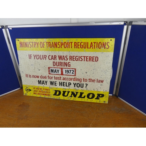 195 - A large vintage Dunlop 'Ministry of Transport Regulations' board/ sign. Approx 50x76cm.