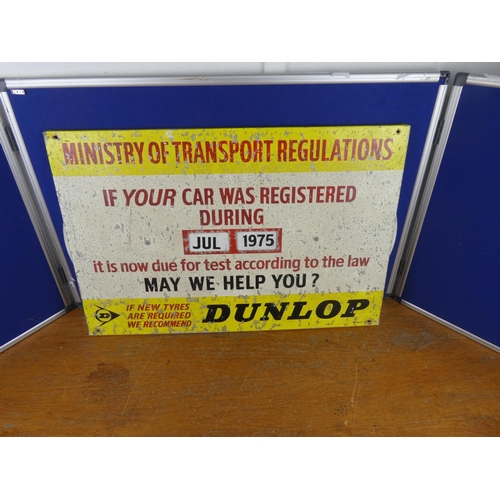 195 - A large vintage Dunlop 'Ministry of Transport Regulations' board/ sign. Approx 50x76cm.