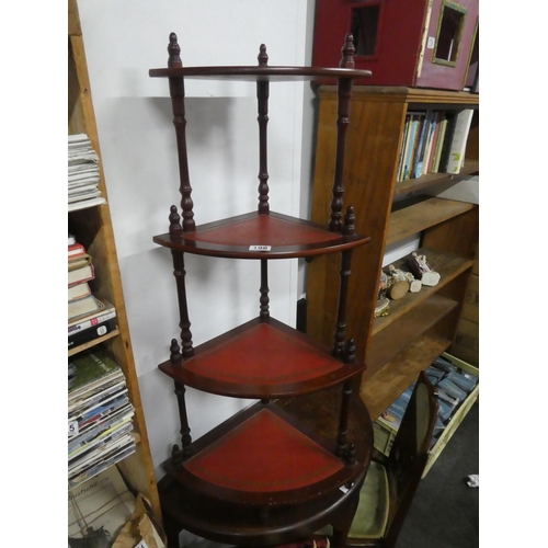 198 - A whatnot corner display with leather tops. Approx 103cm tall.