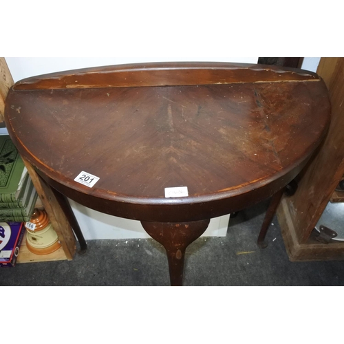 201 - A mahogany demilune table. Approx 72cm.