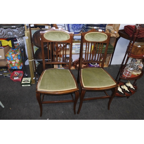 203 - A stunning pair of antique upholstered hall chairs with inlay detail.