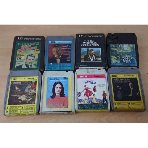 214 - A lot of vintage 8 track cassette tapes.