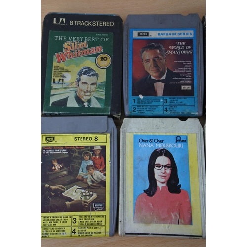 214 - A lot of vintage 8 track cassette tapes.