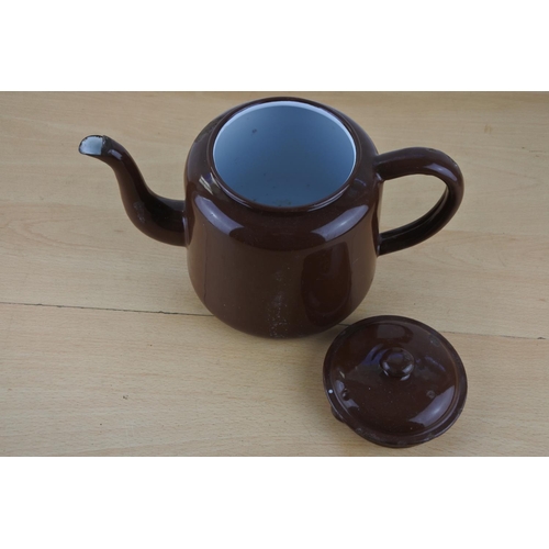 216 - A vintage brown enamel teapot.