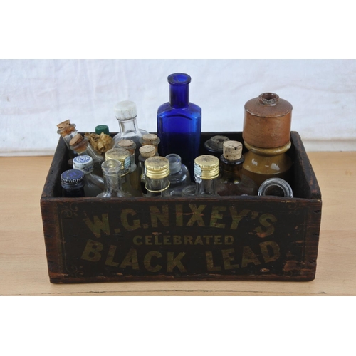 219 - A small wooden box and a lot of miniature bottles to include Castrol Oil, Kay's Linseed Compound, st... 