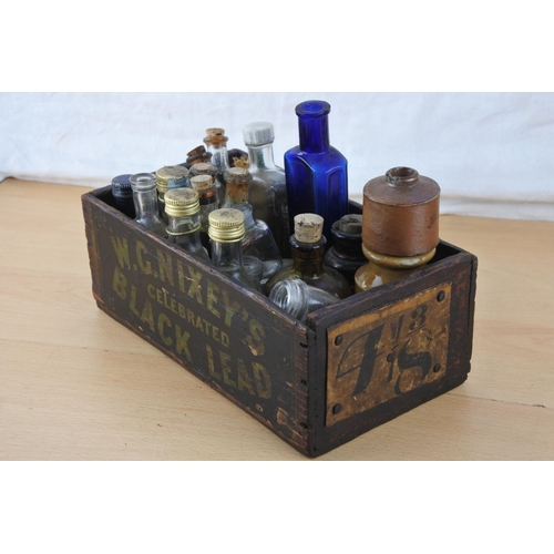 219 - A small wooden box and a lot of miniature bottles to include Castrol Oil, Kay's Linseed Compound, st... 