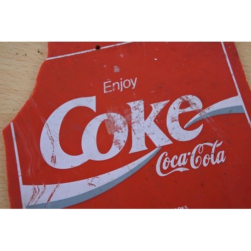 222 - A Coca Cola advertising sign (a/f). Approx 14x14cm.