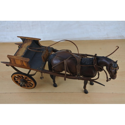 225 - A stunning USA toy horse and a wooden cart with rubber tyres.