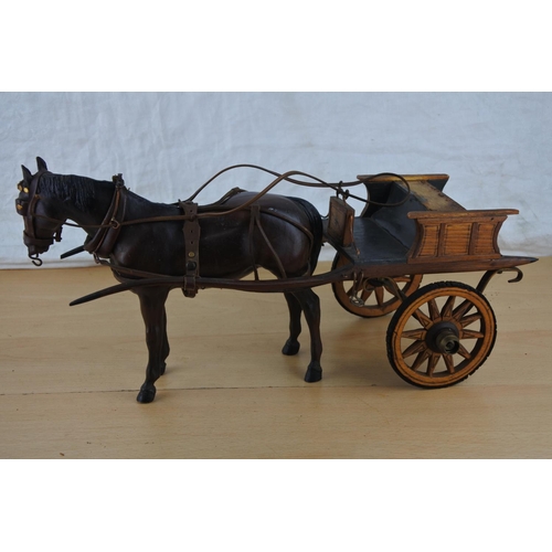 225 - A stunning USA toy horse and a wooden cart with rubber tyres.