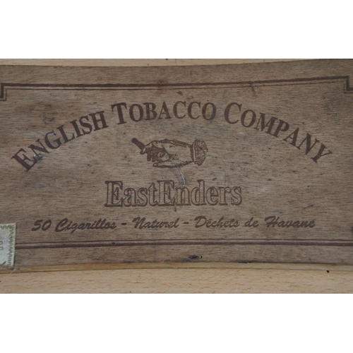 239 - A vintage wooden tobacco box 'Eastenders'.