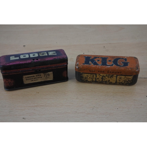 241 - A vintage KLG tin box with spark plug and another Lodge tin box.