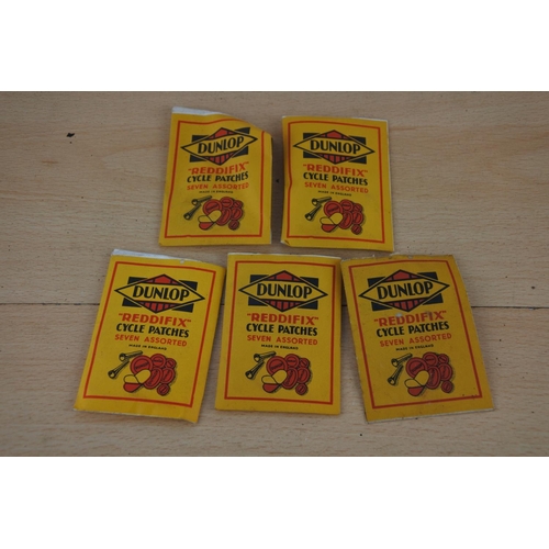 243 - Five vintage Dunlop cycle patches.