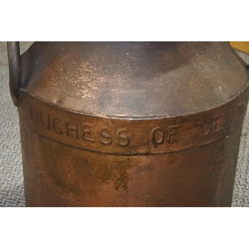 252 - A stunning antique copper milk can . Approx 49cm tall.