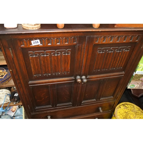 258 - An Old Charm two door storage cabinet  with drawers. Approx 117x84cm.