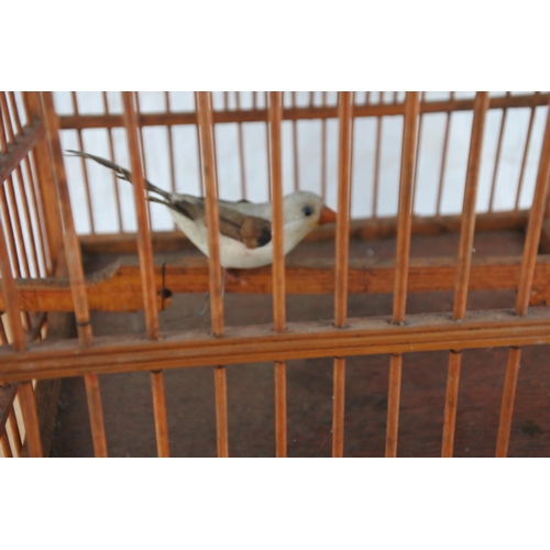 263 - A wooden bird cage.