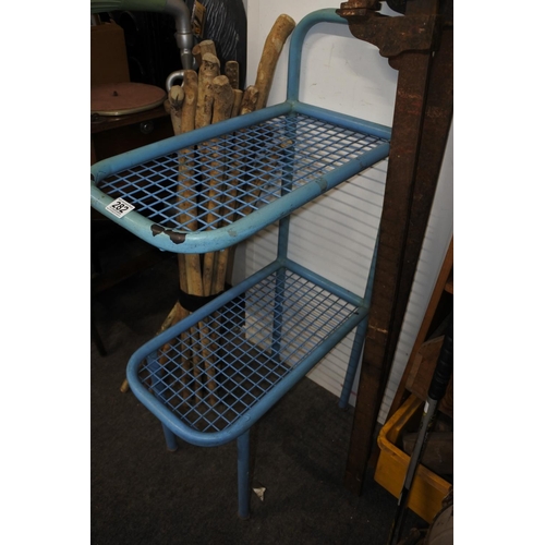 282 - A unusual vintage two tier metal shelf stand.