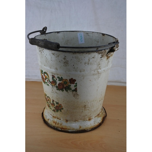 287 - A vintage white enamel water bucket with hand painted detail.